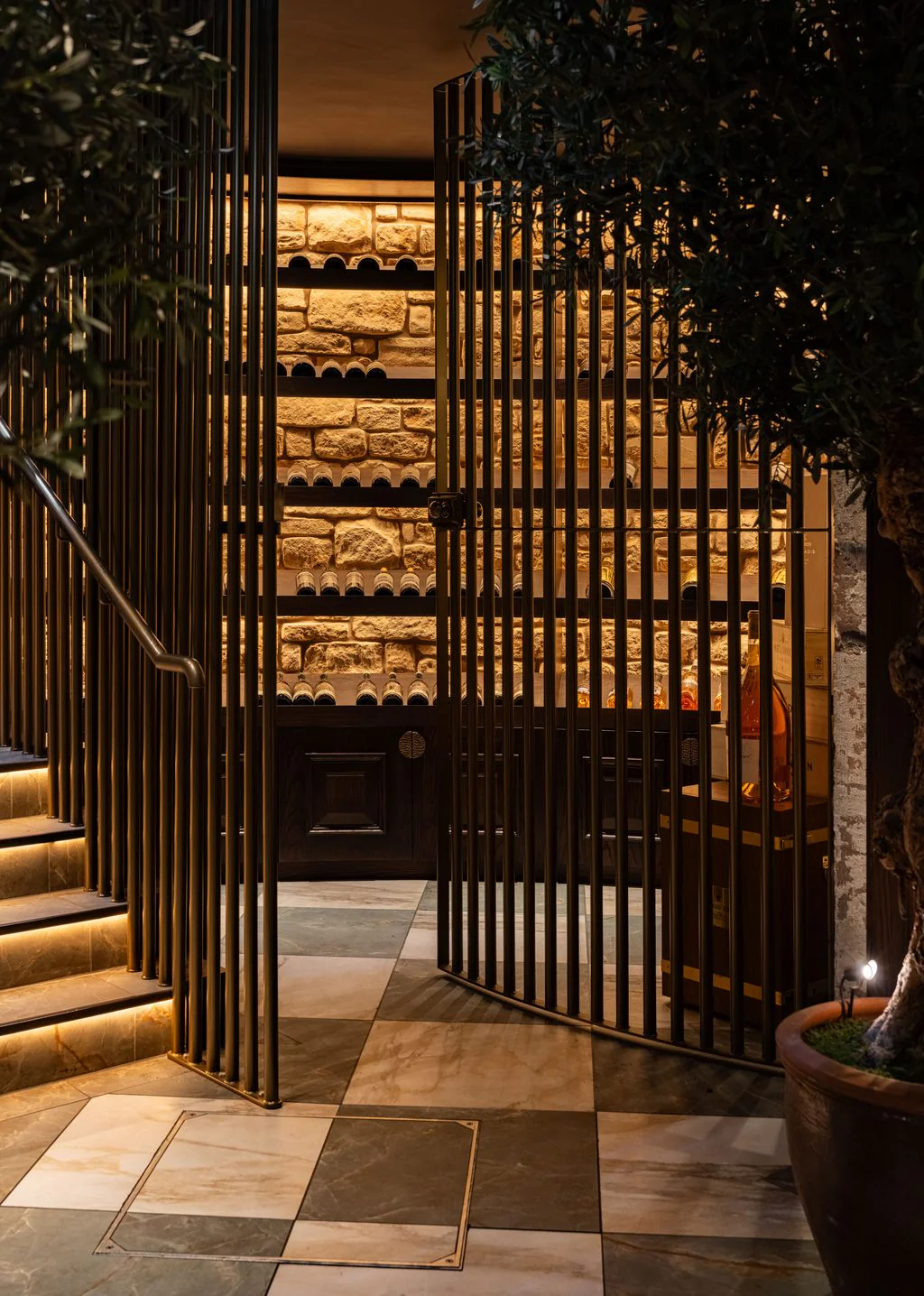 Corridor with stone wall, timber slats and tiled floor
