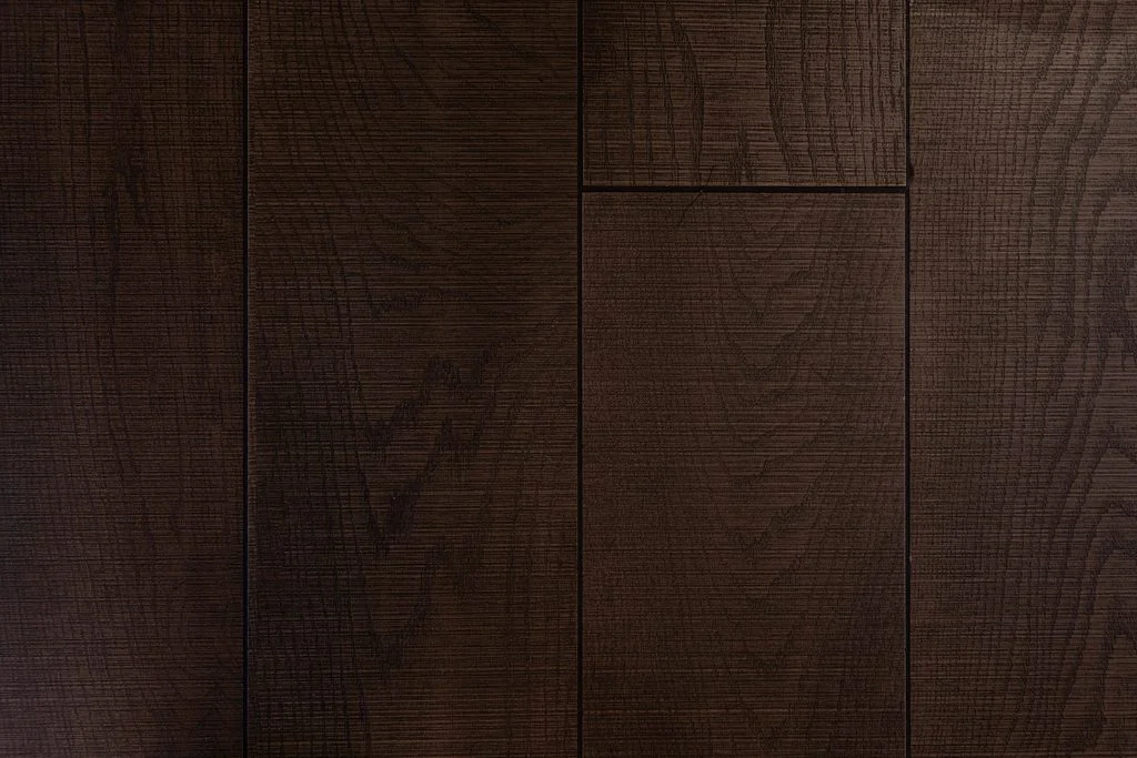 Detail of dark oak wall panelling