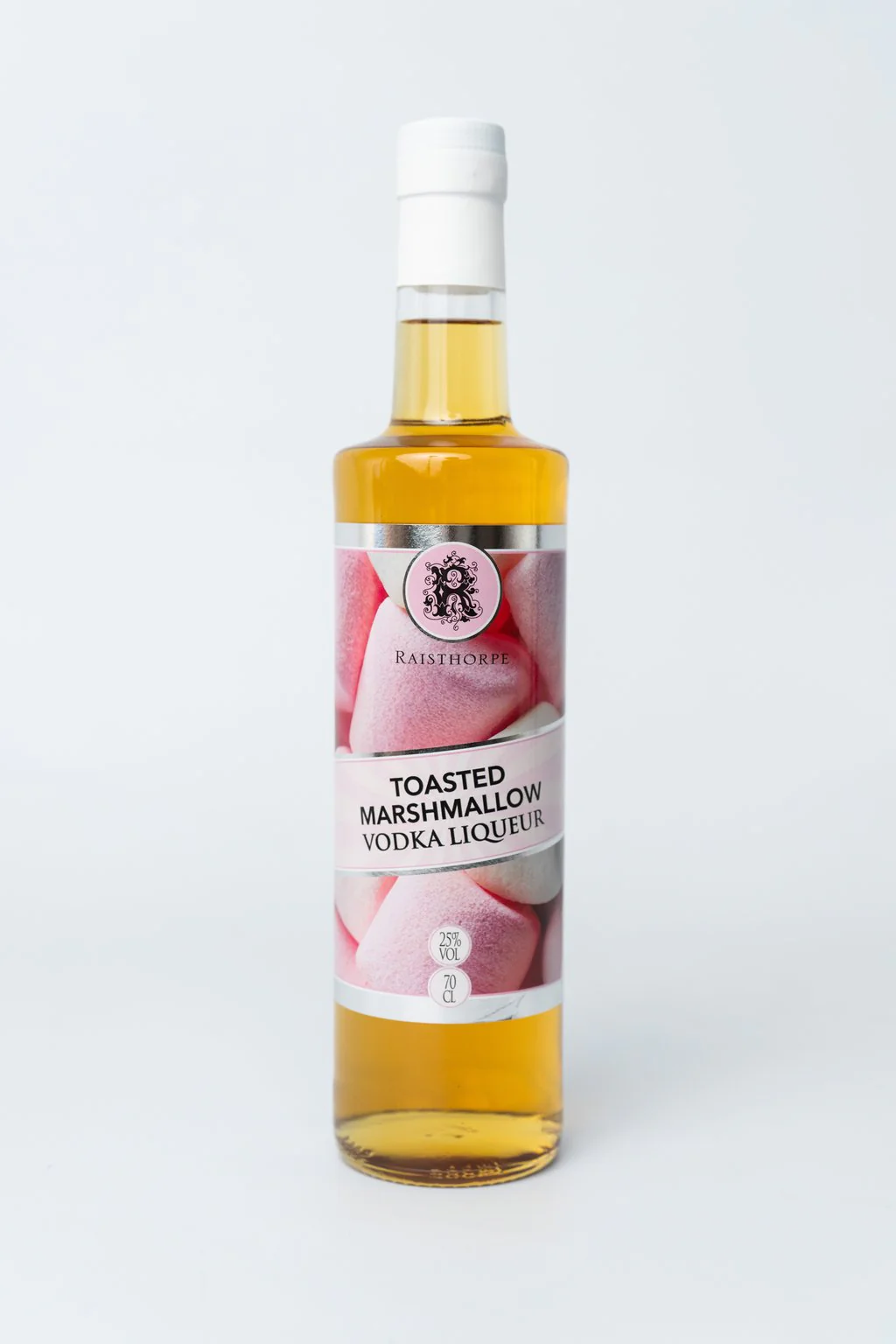 Bottle of vodka liqueur on a plain white background