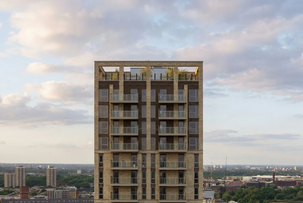 Residential tower at dusk, aerial view