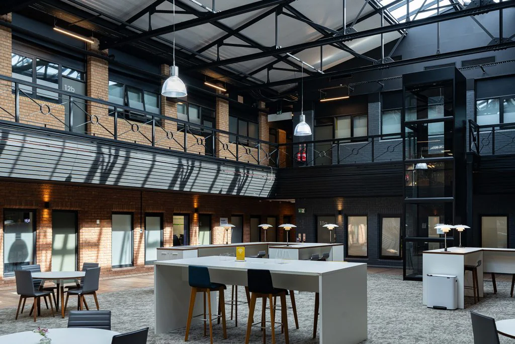 Office atrium with glazed roof and seating