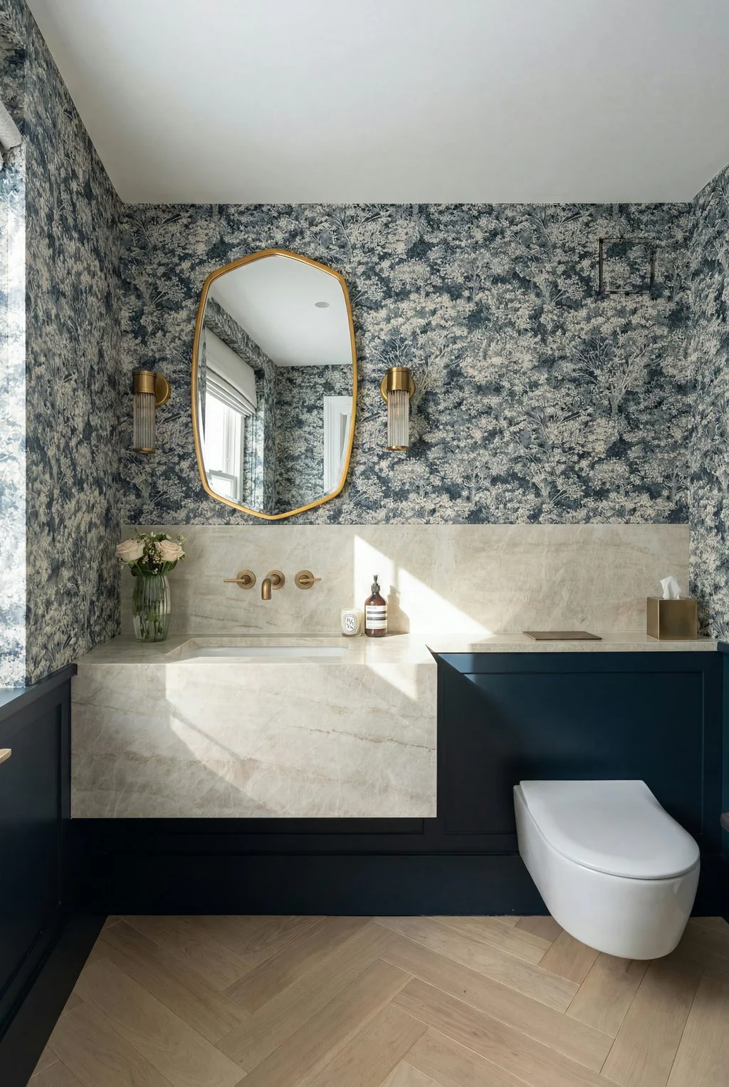 Cloakroom with patterned wallpaper and marble basin