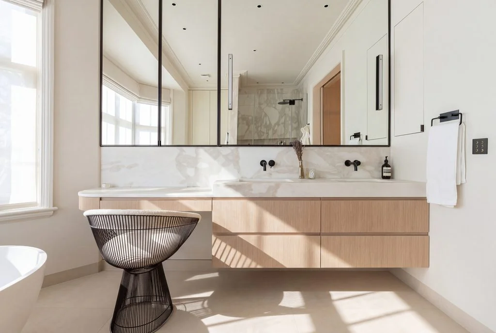 Bathroom with double vanity and freestanding bath