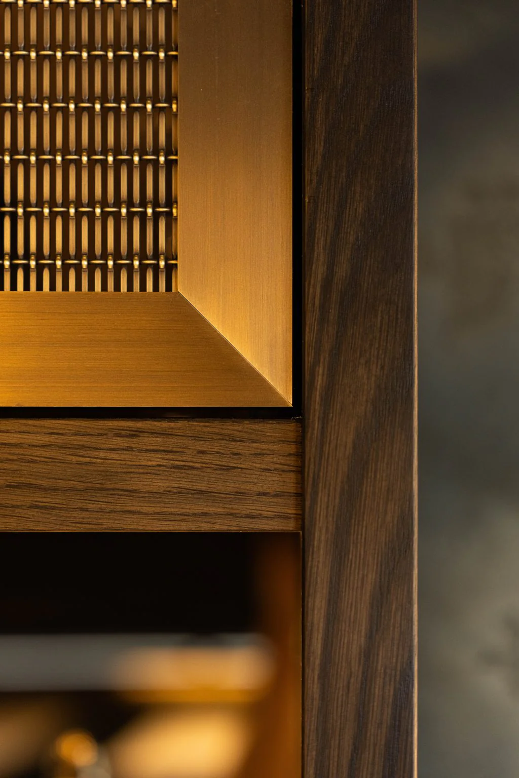 Brass mesh and oak joinery detail