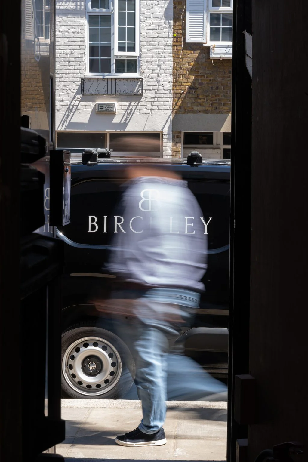 Branded van in a courtyard, the sort of photo worth adding to a Google profile