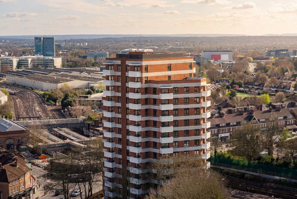 Aerial view of a brick residential tower