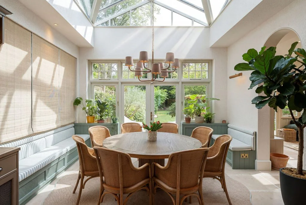 Conservatory dining room with skylights