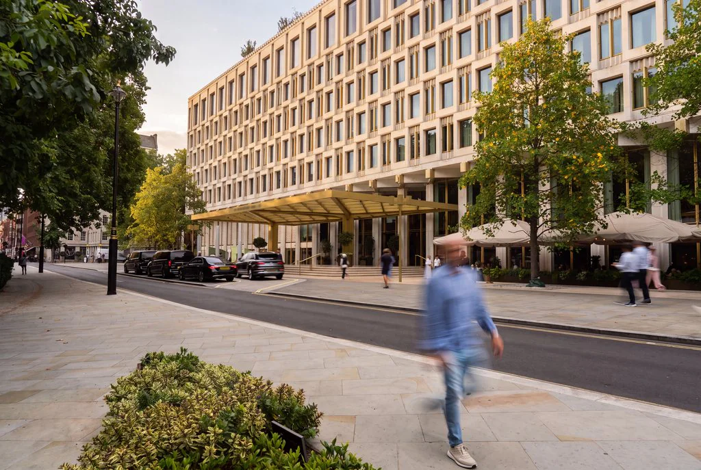 Street view of a stone-clad city building